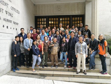 Group photo with Dr. Ting in front of Central Government Offices